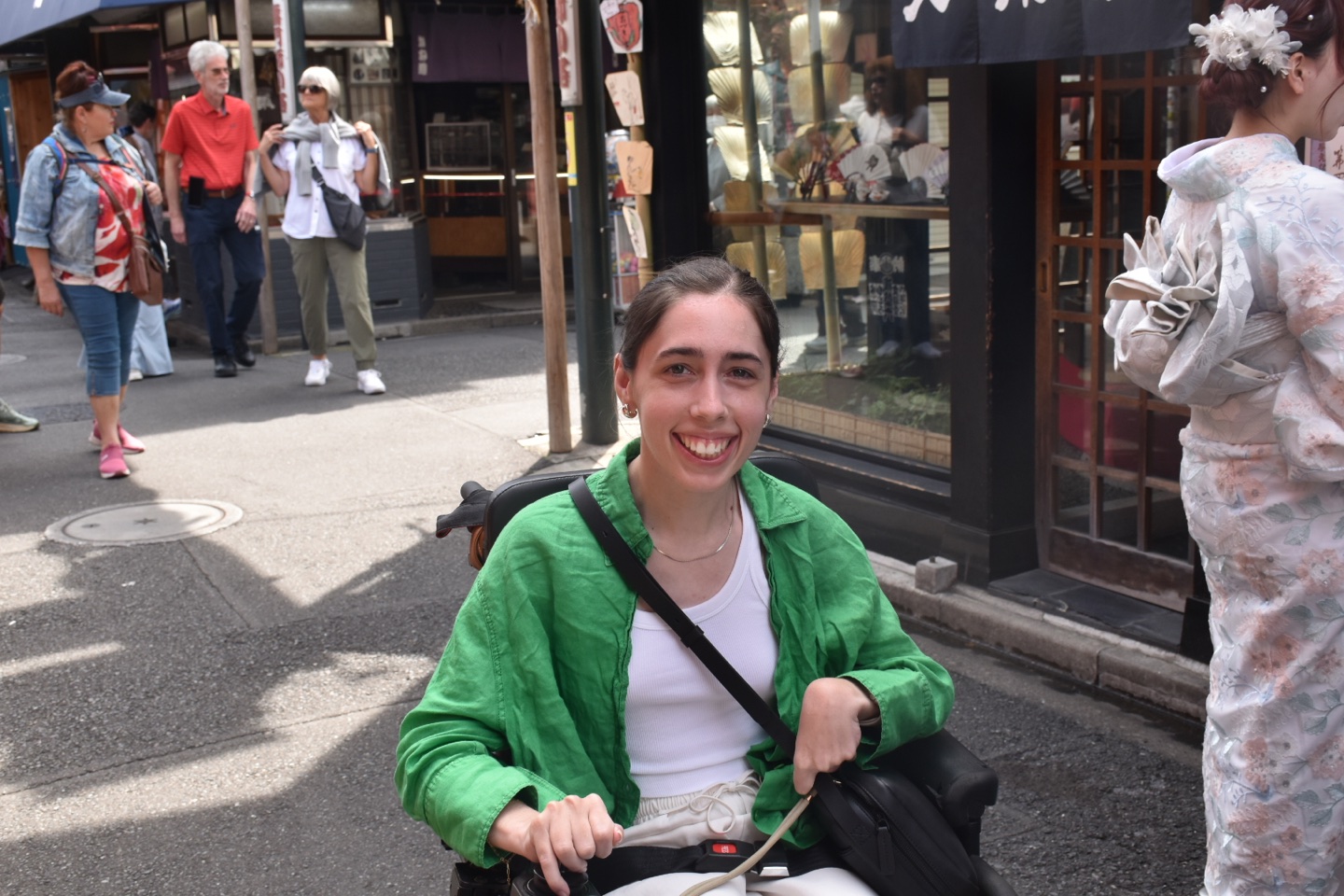A guest exploring Asakusa in her powered wheelchair.